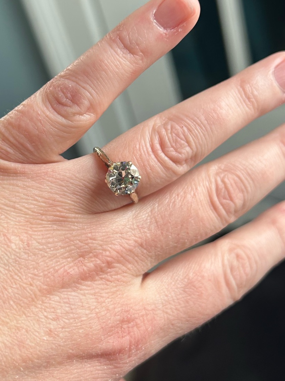 2.11 OEC diamond in antique setting